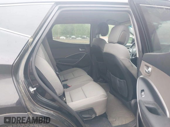 2014 Hyundai Santa Fe z VIN 5XYZUDLB9EG224174, wystawiony jako IAAI lot #42244140 z przebiegiem 84 341 mil mil oraz . Historia ofert i sprzedaży dostępna na DreamBid. Obrazek 8.