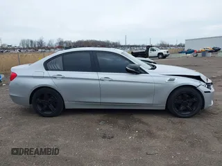 2014 BMW 3 Series 320i xDrive with VIN WBA3C3C58EP661364, listed as a IAAI auction lot 41947049 with 211,982 mi miles and . Bid and sale history available at DreamBid. Image 13.