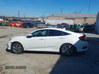2018 Honda Civic EX with VIN 2HGFC2F75JH511025, listed as a IAAI auction lot 41768733 with 56,707 mi miles and . Bid and sale history available at DreamBid. Image 14.