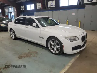 2015 BMW 7 Series 750Li with VIN WBAYE8C59FD782291, listed as a Copart auction lot 84537744 with 151,087 mi miles and Clean title. Bid and sale history available at DreamBid. Image 4.