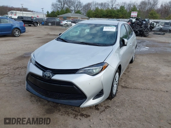 2019 Toyota Corolla L with VIN 5YFBURHE2KP934042, listed as a IAAI auction lot 41963491 with 87,299 mi miles. Bid and sale history available at carsss.com. Image 18.