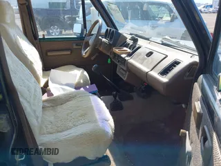 1990 Isuzu Trooper z VIN JACCH58EXL7903060, wystawiony jako IAAI lot #42516100 z przebiegiem 189 700 mil mil oraz . Historia ofert i sprzedaży dostępna na DreamBid. Obrazek 5.