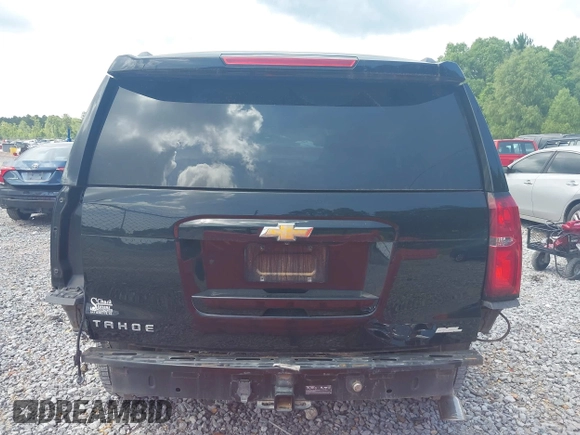 2015 Chevrolet Tahoe LTZ z VIN 1GNSCCKC8FR121461, wystawiony jako IAAI lot #42407901 z przebiegiem 137 729 mil mil oraz . Historia ofert i sprzedaży dostępna na DreamBid. Obrazek 17.