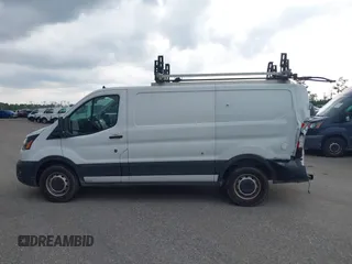 2020 Ford Transit Cargo with VIN 1FTBR1Y8XLKA19646, listed as a IAAI auction lot 42633323 with 82,577 mi miles and . Bid and sale history available at DreamBid. Image 14.