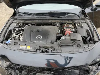 2021 Mazda 3 S z VIN JM1BPAAL8M1323750, wystawiony jako Copart lot #60162145 z przebiegiem 53 235 mil mil oraz Szkoda całkowita • Salvage title. Historia ofert i sprzedaży dostępna na DreamBid. Obrazek 11.
