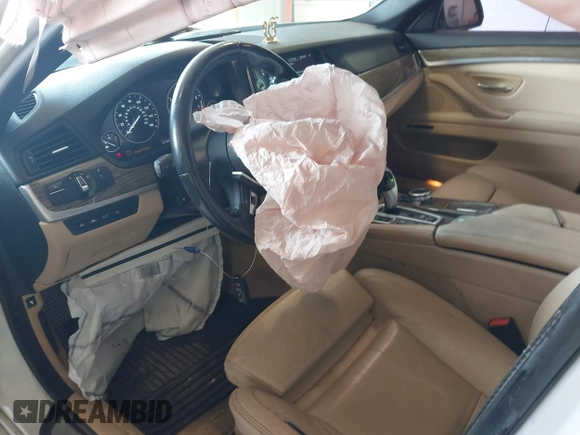 2014 BMW 5 Series 535i xDrive with VIN WBA5B3C58ED530822, listed as a IAAI auction lot 42561366 with 137,880 mi miles and . Bid and sale history available at DreamBid. Image 5.
