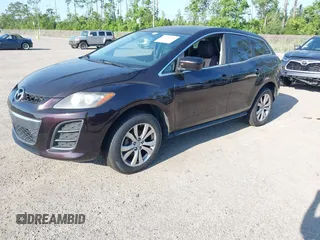 2011 Mazda CX-7 S Touring z VIN JM3ER4CLXB0358063, wystawiony jako IAAI lot #42325445 z przebiegiem 156 206 mil mil oraz . Historia ofert i sprzedaży dostępna na DreamBid. Obrazek 2.