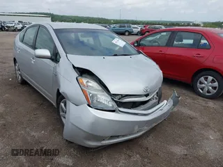 2007 Toyota Prius z VIN JTDKB20U873273942, wystawiony jako IAAI lot #42113046 z przebiegiem 126 635 mil mil oraz . Historia ofert i sprzedaży dostępna na DreamBid. Obrazek 1.