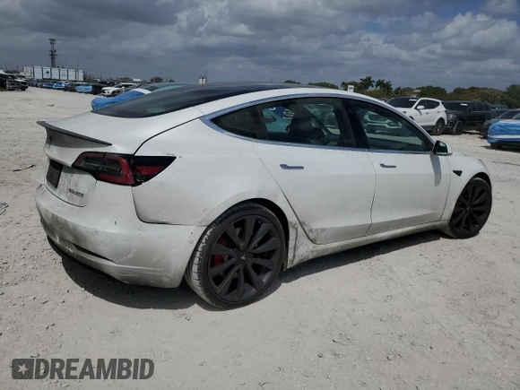 2020 Tesla Model 3 Performance z VIN 5YJ3E1EC4LF800149, wystawiony jako Copart lot #48711045 z przebiegiem 95 229 mil mil oraz Szkoda całkowita • Salvage title. Historia ofert i sprzedaży dostępna na DreamBid. Obrazek 3.