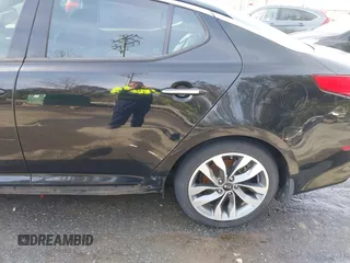 2015 Kia Optima SX Turbo with VIN 5XXGR4A67FG407786, listed as a IAAI auction lot 41606324 with 194,837 mi miles. Bid and sale history available at carsss.com. Image 18.