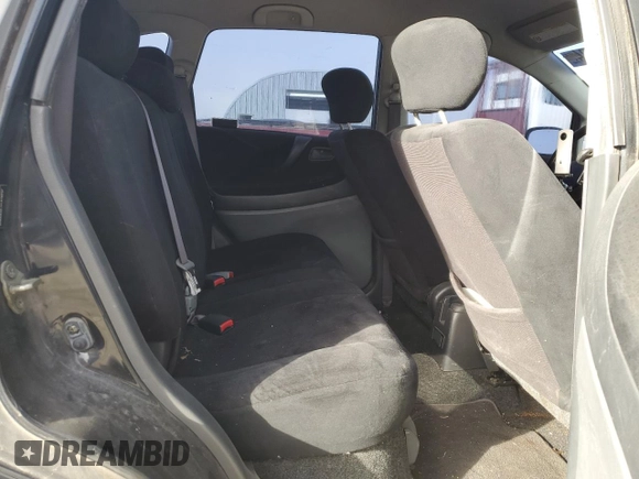 2003 Suzuki Aerio SX z VIN JS2RC41H135205642, wystawiony jako Copart lot #77690224 z przebiegiem 161 414 mil mil oraz Szkoda całkowita • Salvage title. Historia ofert i sprzedaży dostępna na DreamBid. Obrazek 10.