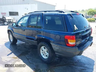 2004 Jeep Grand Cherokee Laredo z VIN 1J4GW48S44C204714, wystawiony jako IAAI lot #42137857 z przebiegiem 251 591 mil mil oraz . Historia ofert i sprzedaży dostępna na DreamBid. Obrazek 3.
