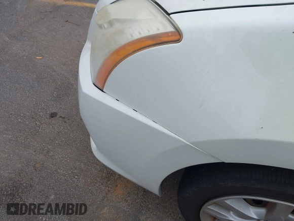 2012 Nissan Sentra S with VIN 3N1AB6AP4CL767910, listed as a IAAI auction lot 42383753 with 144,577 mi miles and . Bid and sale history available at DreamBid. Image 6.