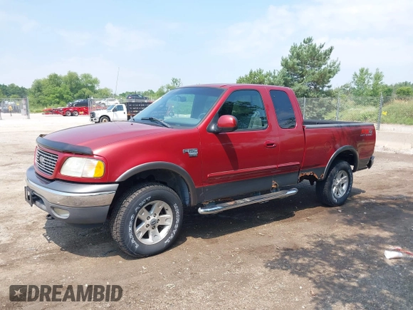 2002 Ford F-150 XL with VIN 1FTRX18L42NA99340, listed as a IAAI auction lot 42641912 with 98,195 mi miles and . Bid and sale history available at DreamBid. Image 2.
