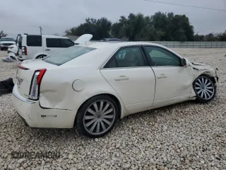 2009 Cadillac CTS RWD z VIN 1G6DV57V490160948, wystawiony jako Copart lot #83825094 z przebiegiem 184 368 mil mil oraz Szkoda całkowita • Salvage title. Historia ofert i sprzedaży dostępna na DreamBid. Obrazek 3.