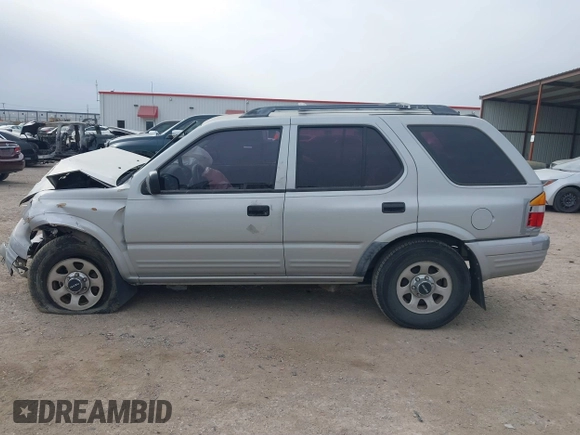 1999 Isuzu Rodeo S with VIN 4S2CK58W4X4358898, listed as a IAAI auction lot 41360738 with 184,948 mi miles and . Bid and sale history available at carsss.com. Image 14.