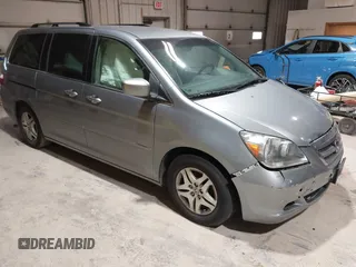 2006 Honda Odyssey EX with VIN 5FNRL38486B090693, listed as a IAAI auction lot 41865491 with 198,104 mi miles. Bid and sale history available at carsss.com. Image 1.