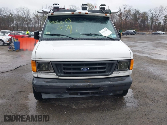 2004 Ford Econoline Cargo with VIN 1FTRE14W44HB53758, listed as a IAAI auction lot 40926124 with 139,104 mi miles. Bid and sale history available at carsss.com. Image 11.