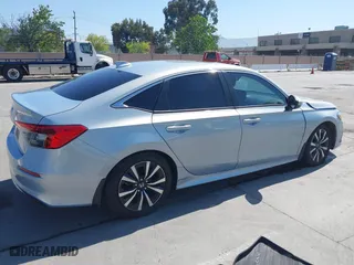 2022 Honda Civic Sedan EX with VIN 2HGFE1F77NH309152, listed as a IAAI auction lot 42013565 with 25,474 mi miles. Bid and sale history available at carsss.com. Image 4.