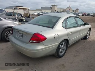 2006 Ford Taurus SE with VIN 1FAFP53U16A221651, listed as a IAAI auction lot 42065261 with 159,411 mi miles. Bid and sale history available at carsss.com. Image 4.