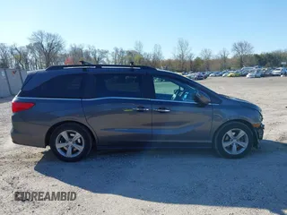 2020 Honda Odyssey EX with VIN 5FNRL6H54LB052660, listed as a IAAI auction lot 42051157 with 51,159 mi miles and . Bid and sale history available at DreamBid. Image 13.