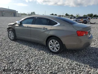 2017 Chevrolet Impala LT with VIN 2G1105S34H9184877, listed as a Copart auction lot 52878955 with 27,480 mi miles and Salvage Title. Bid and sale history available at carsss.com. Image 2.
