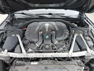 2019 BMW 7 Series 750i with VIN WBA7F0C50KGM26010, listed as a IAAI auction lot 42188421 with 71,576 mi miles and . Bid and sale history available at DreamBid. Image 10.