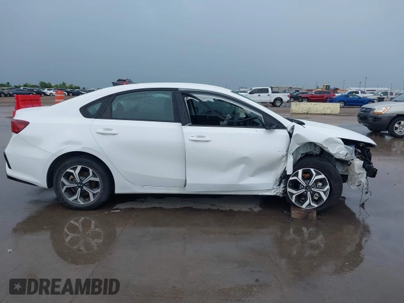 2021 Kia Forte LXS z VIN 3KPF24ADXME377638, wystawiony jako IAAI lot #42467878 z przebiegiem 53 446 mil mil oraz . Historia ofert i sprzedaży dostępna na DreamBid. Obrazek 14.