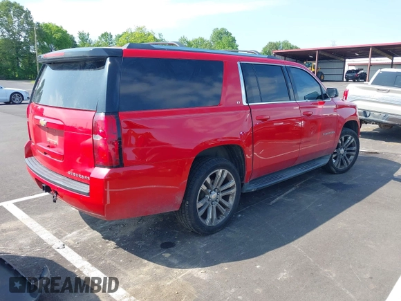 2015 Chevrolet Suburban LT with VIN 1GNSCJKC8FR291713, listed as a IAAI auction lot 42323281 with 226,708 mi miles and . Bid and sale history available at DreamBid. Image 4.