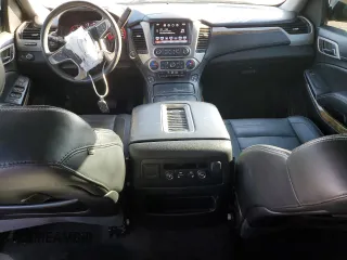 2016 GMC Yukon Denali with VIN 1GKS1CKJXGR329103, listed as a Copart auction lot 75492494 with 124,374 mi miles and Salvage Title. Bid and sale history available at carsss.com. Image 8.