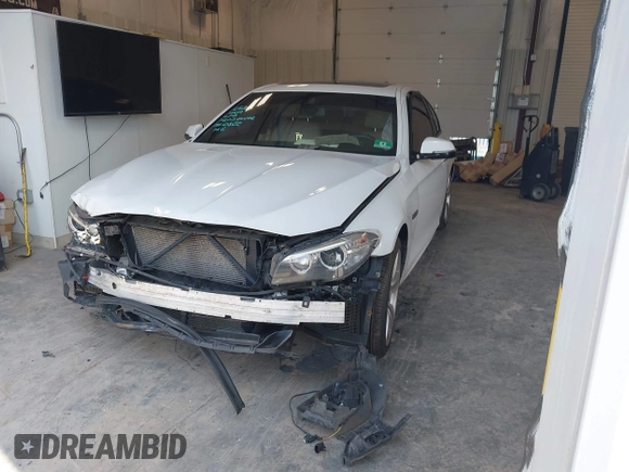 2014 BMW 5 Series 535i xDrive with VIN WBA5B3C58ED530822, listed as a IAAI auction lot 42561366 with 137,880 mi miles and . Bid and sale history available at DreamBid. Image 2.
