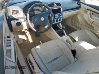 2009 Volkswagen Eos Komfort с VIN WVWAA71F99V016050, выставлен на аукционе Copart как лот 58229565 с пробегом 105 584 миль миль и Списание • Salvage title. История ставок и продаж доступна на DreamBid. Изображение 8.