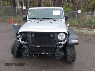 2022 Jeep Wrangler Unlimited Willys Sport with VIN 1C4HJXDM9NW272685, listed as a IAAI auction lot 41948921 with Not provided miles and . Bid and sale history available at DreamBid. Image 12.