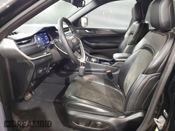 2023 Jeep Grand Cherokee Altitude with VIN 1C4RJHAG8PC580637, listed as a Copart auction lot 56832715 with 56,060 mi miles and Clean title. Bid and sale history available at DreamBid. Image 7.