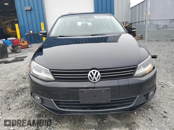 2014 Volkswagen Jetta Comfortline с VIN 3VWDL7AJ2EM366052, выставлен на аукционе Copart как лот 69010344 с пробегом 210 092 миль миль и Списание • Salvage title. История ставок и продаж доступна на DreamBid. Изображение 5.