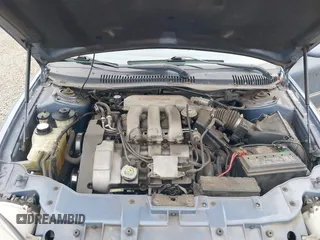 1999 Mercury Sable LS z VIN 1MEFM53S5XA647862, wystawiony jako IAAI lot #41762714 z przebiegiem 165 490 mil mil oraz . Historia ofert i sprzedaży dostępna na DreamBid. Obrazek 10.