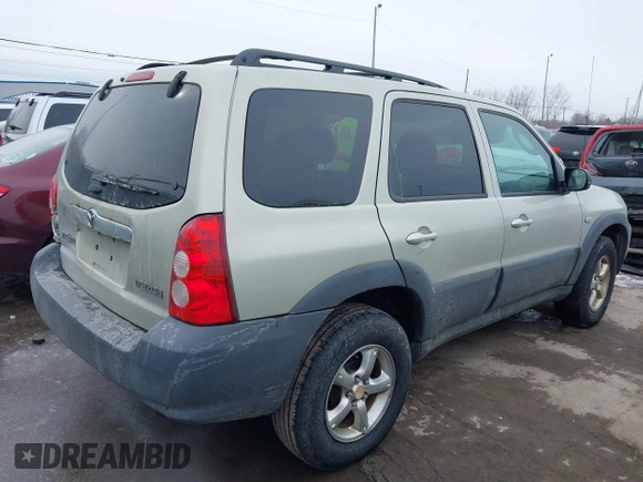 2005 Mazda Tribute i with VIN 4F2YZ02Z35KM57658, listed as a IAAI auction lot 41547562 with 131,303 mi miles and . Bid and sale history available at carsss.com. Image 4.