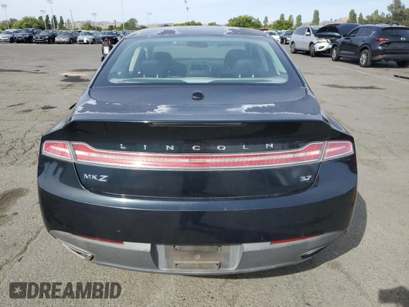2014 Lincoln MKZ z VIN 3LN6L2GK6ER806741, wystawiony jako Copart lot #57455755 z przebiegiem 96 849 mil mil oraz Szkoda całkowita • Salvage title. Historia ofert i sprzedaży dostępna na DreamBid. Obrazek 6.