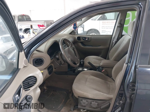 2004 Hyundai Santa Fe GLS with VIN KM8SC73D04U846243, listed as a IAAI auction lot 42126245 with 153,229 mi miles. Bid and sale history available at carsss.com. Image 5.