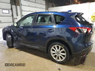 2015 Mazda CX-5 Grand Touring with VIN JM3KE4DY0F0493650, listed as a Copart auction lot 86371104 with 226,752 mi miles and Non Repairable. Bid and sale history available at DreamBid. Image 2.