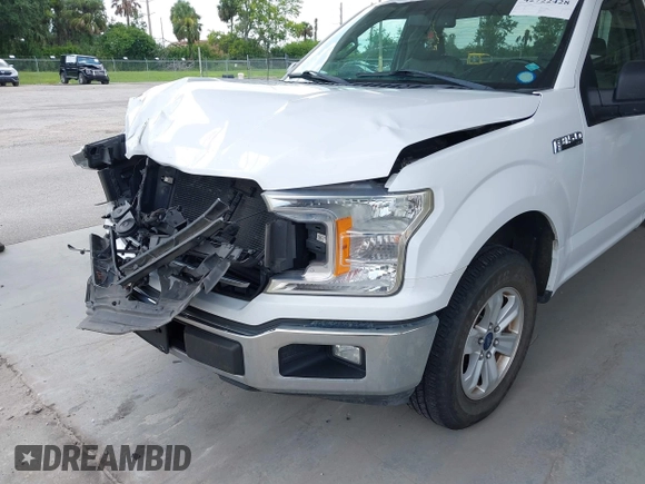 2018 Ford F-150 XL with VIN 1FTMF1CP7JKE12307, listed as a IAAI auction lot 42722428 with 228,606 mi miles and . Bid and sale history available at DreamBid. Image 6.