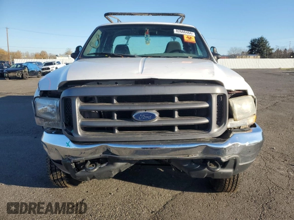 2002 Ford F-350 XL with VIN 1FTSX31S72ED14126, listed as a Copart auction lot 82688484 with 202,780 mi miles and Salvage Title. Bid and sale history available at DreamBid. Image 5.
