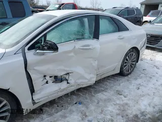 2017 Lincoln MKZ Hybrid Premiere with VIN 3LN6L5KU8HR624523, listed as a IAAI auction lot 41649075 with 126,679 mi miles. Bid and sale history available at carsss.com. Image 6.