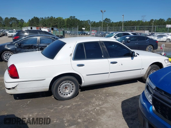 2000 Mercury Grand Marquis LS z VIN 2MEFM75W3YX689323, wystawiony jako IAAI lot #42019687 z przebiegiem 241 045 mil mil oraz . Historia ofert i sprzedaży dostępna na DreamBid. Obrazek 13.