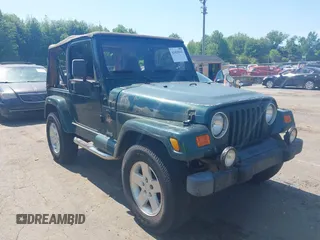 2000 Jeep Wrangler Sahara z VIN 1J4FA59S0YP748057, wystawiony jako IAAI lot #42420342 z przebiegiem 195 963 mil mil oraz . Historia ofert i sprzedaży dostępna na DreamBid. Obrazek 1.