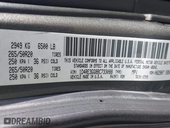 2011 Dodge Durango Heat with VIN 1D4RE3GG8BC733088, listed as a IAAI auction lot 40764161 with 149,846 mi miles. Bid and sale history available at carsss.com. Image 9.