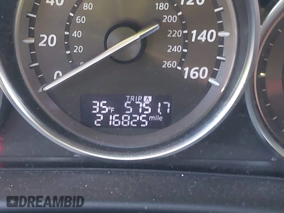 2014 Mazda CX-5 Grand Touring with VIN JM3KE4DY1E0339690, listed as a IAAI auction lot 41668780 with 216,825 mi miles. Bid and sale history available at carsss.com. Image 15.