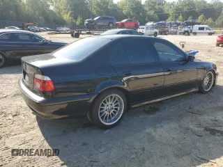 2002 BMW 5 Series 540i with VIN WBADN53412GF70808, listed as a Copart auction lot 69833574 with 193,044 mi miles and Salvage Title. Bid and sale history available at carsss.com. Image 3.
