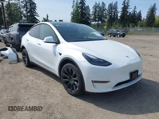 2023 Tesla Model Y Long Range with VIN 7SAYGDEE4PF676167, listed as a IAAI auction lot 42147909 with 20,488 mi miles. Bid and sale history available at carsss.com. Image 1.