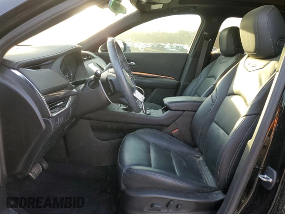 2023 Cadillac XT4 FWD Luxury with VIN 1GYAZAR49PF102307, listed as a Copart auction lot 49342465 with 21,093 mi miles and Salvage Title. Bid and sale history available at DreamBid. Image 7.